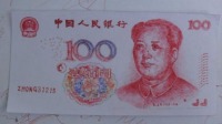 大学生买电脑打印钞票凑数