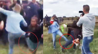 女记者故意绊倒抱孩难民